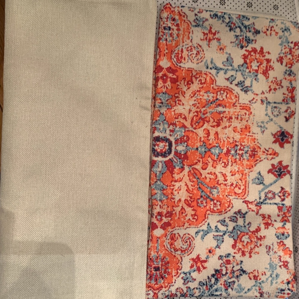 Three matching bright pillow cases.